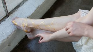 gold kintsugi lines on legs